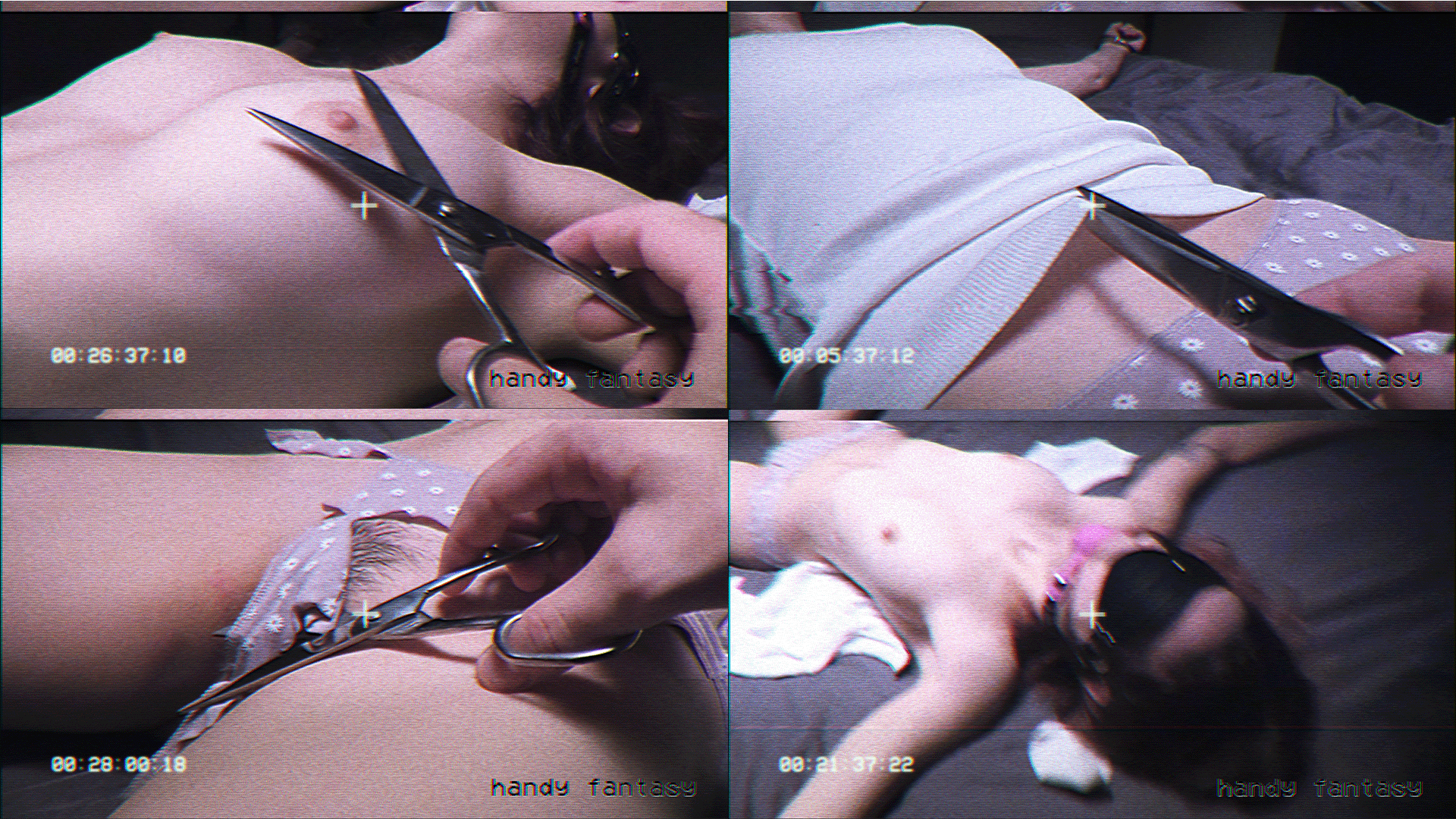 Iris Panik handcuffed to bed, blindfolded and gagged, scissors teasing in bondage scene.